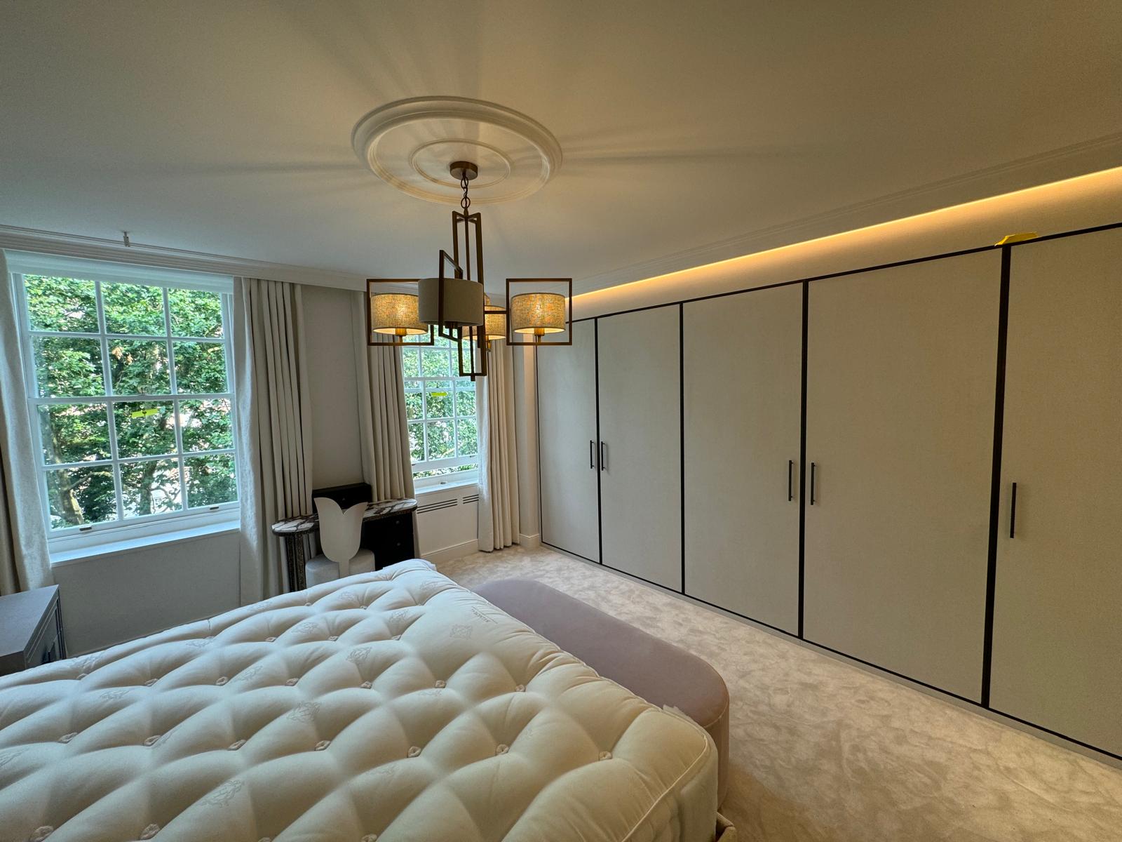 Completed New Level full-height bedroom wardrobe wall